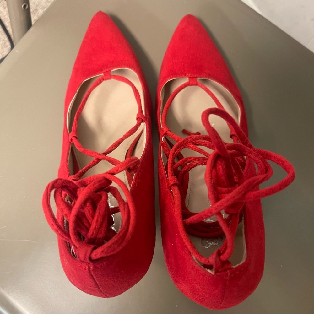 Lace up red velvet heels